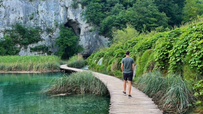 Walking through Plitvice Lakes National Park, one of the best things to do in Croatia