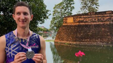 runner post marathon by the gates of Chiang Mai Thailand