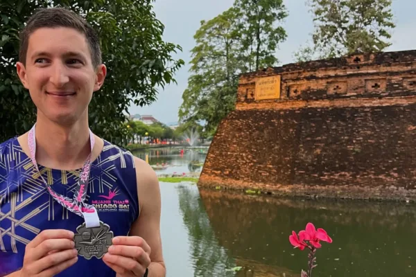 runner post marathon by the gates of Chiang Mai Thailand