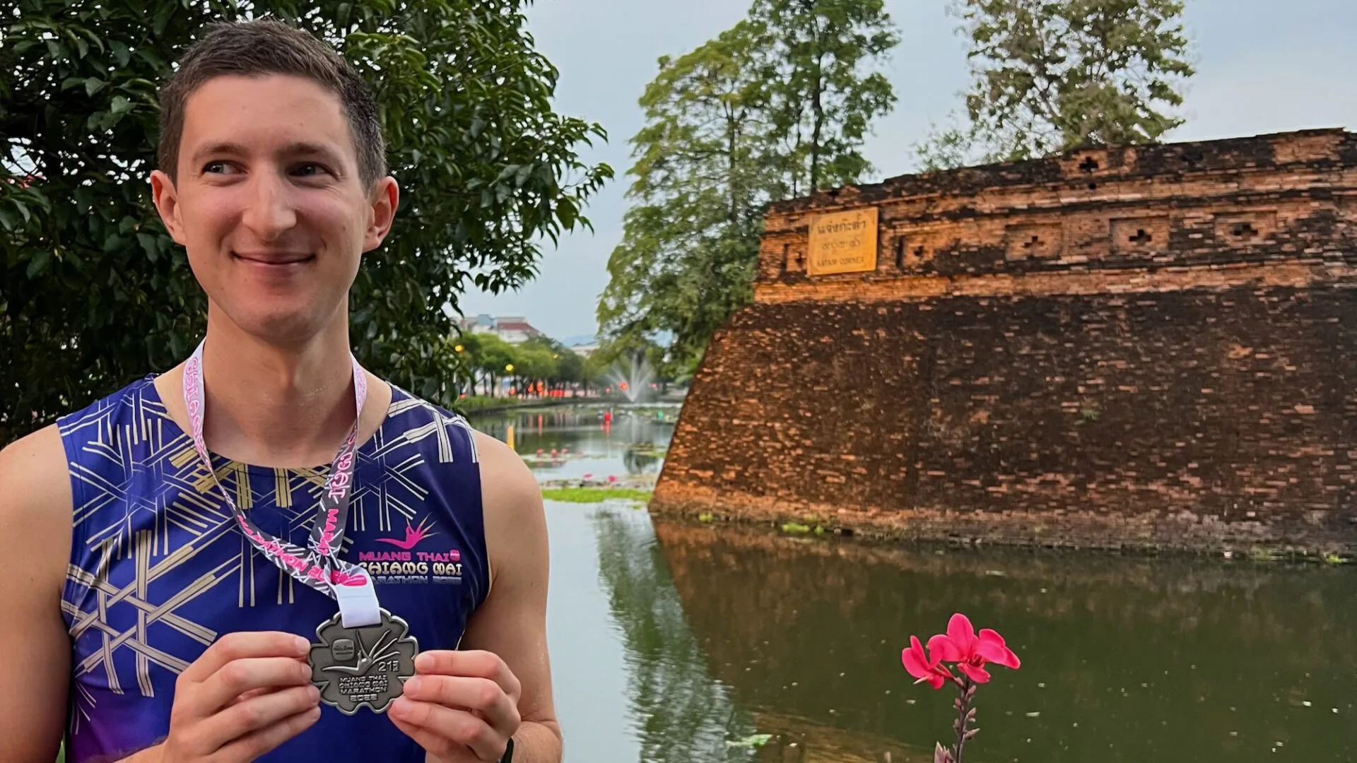 runner post marathon by the gates of Chiang Mai Thailand