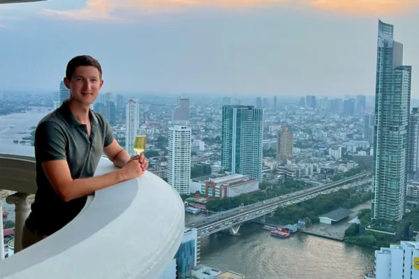 views of city skyline along river in Bangkok Thailand