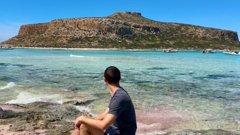pink sand with crystal blue water at balos beach and lagoon is one of the best things to do in Crete Greece