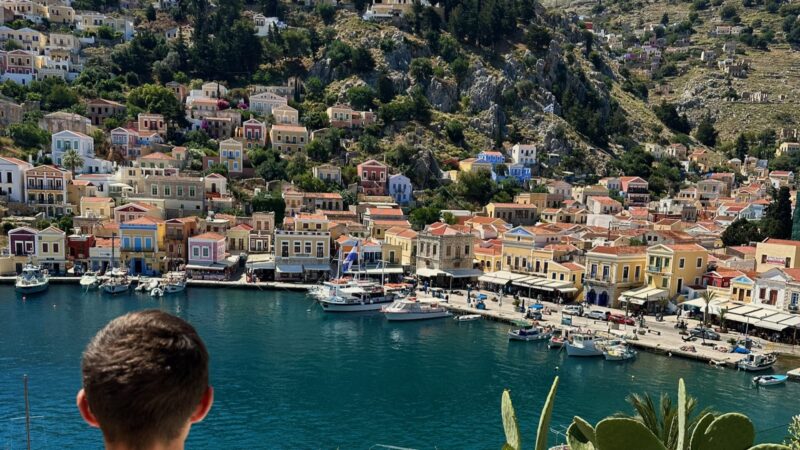 overlooking colorful buildings in downtown Symi Greece