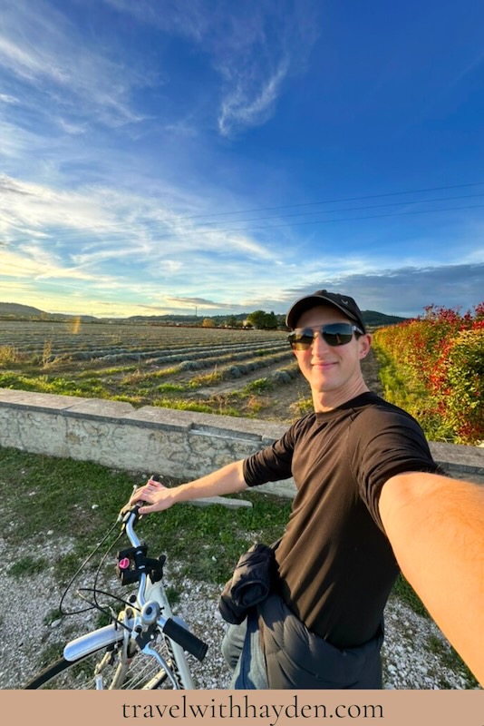 Biker enjoying a scenic landscape.