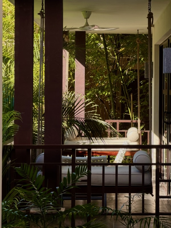 Serene outdoor seating area with greenery