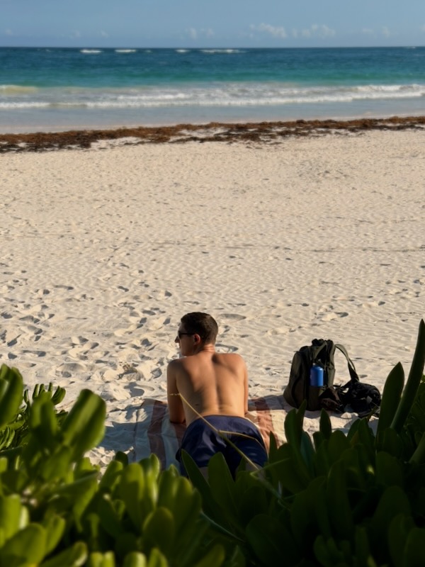 Person relaxing on a beach