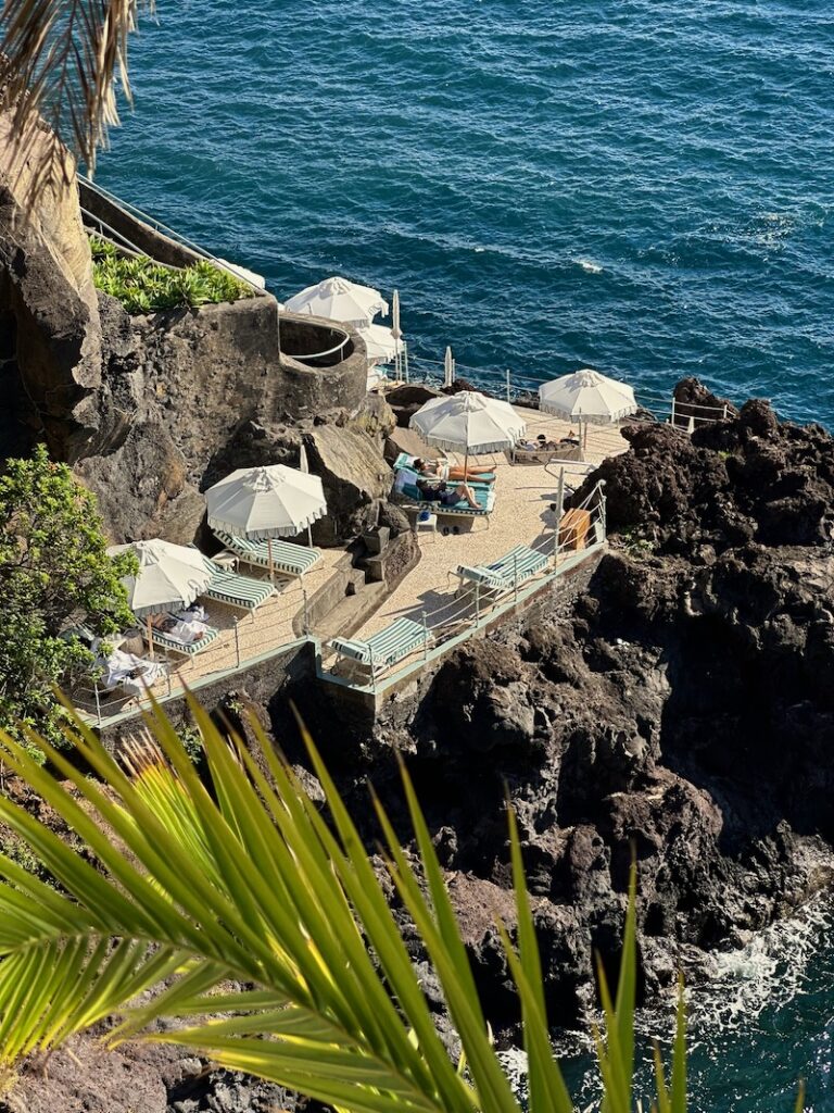 cliffside luxury loungers overlooking natural pools at Reid's Palace Madeira