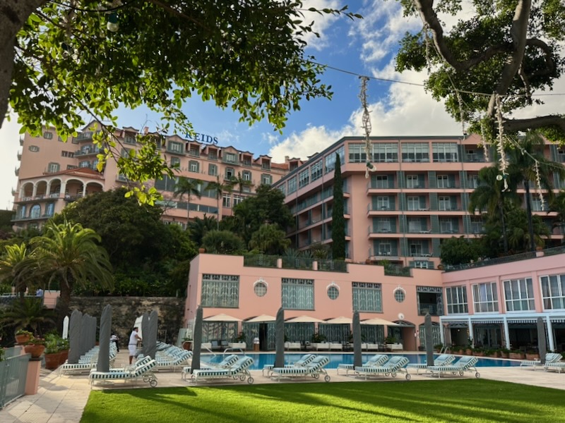 views of Reid's Palace Madeira luxury hotel from pool deck